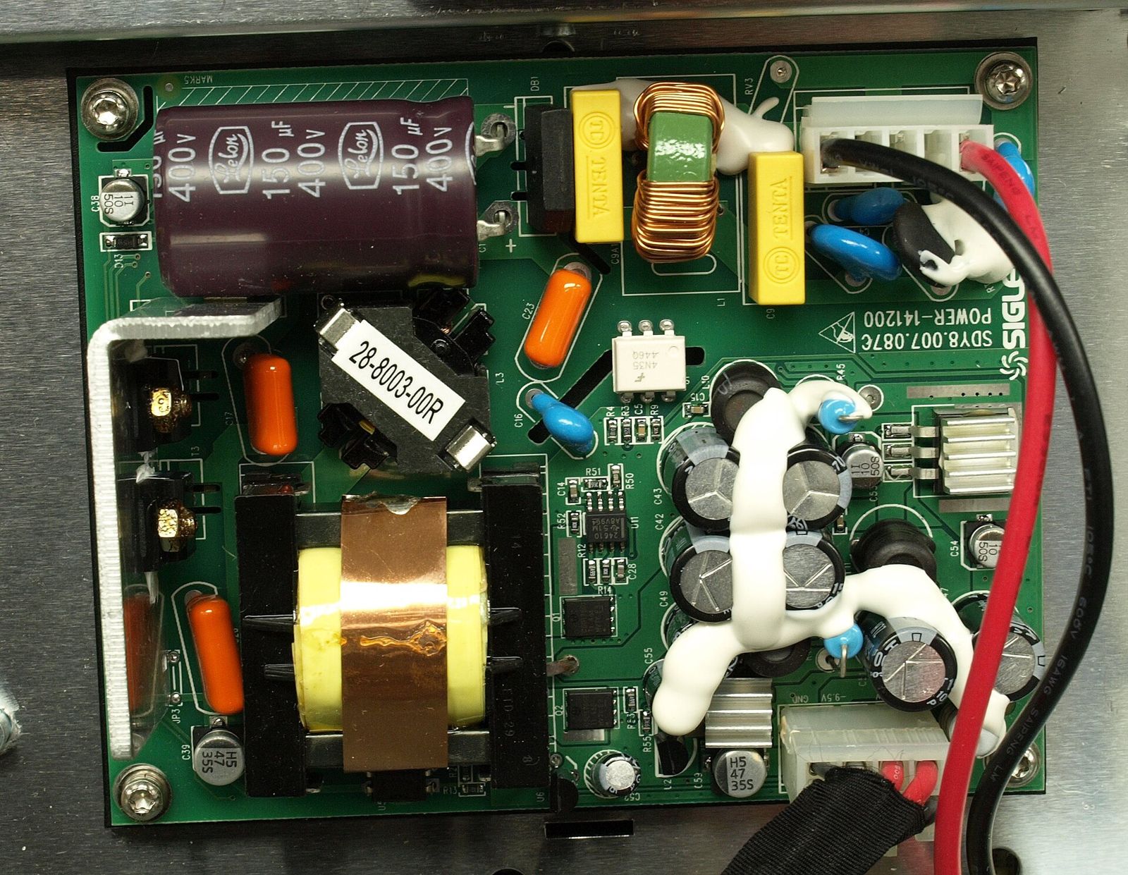 Power-supply board on the bench during teardown and validation
